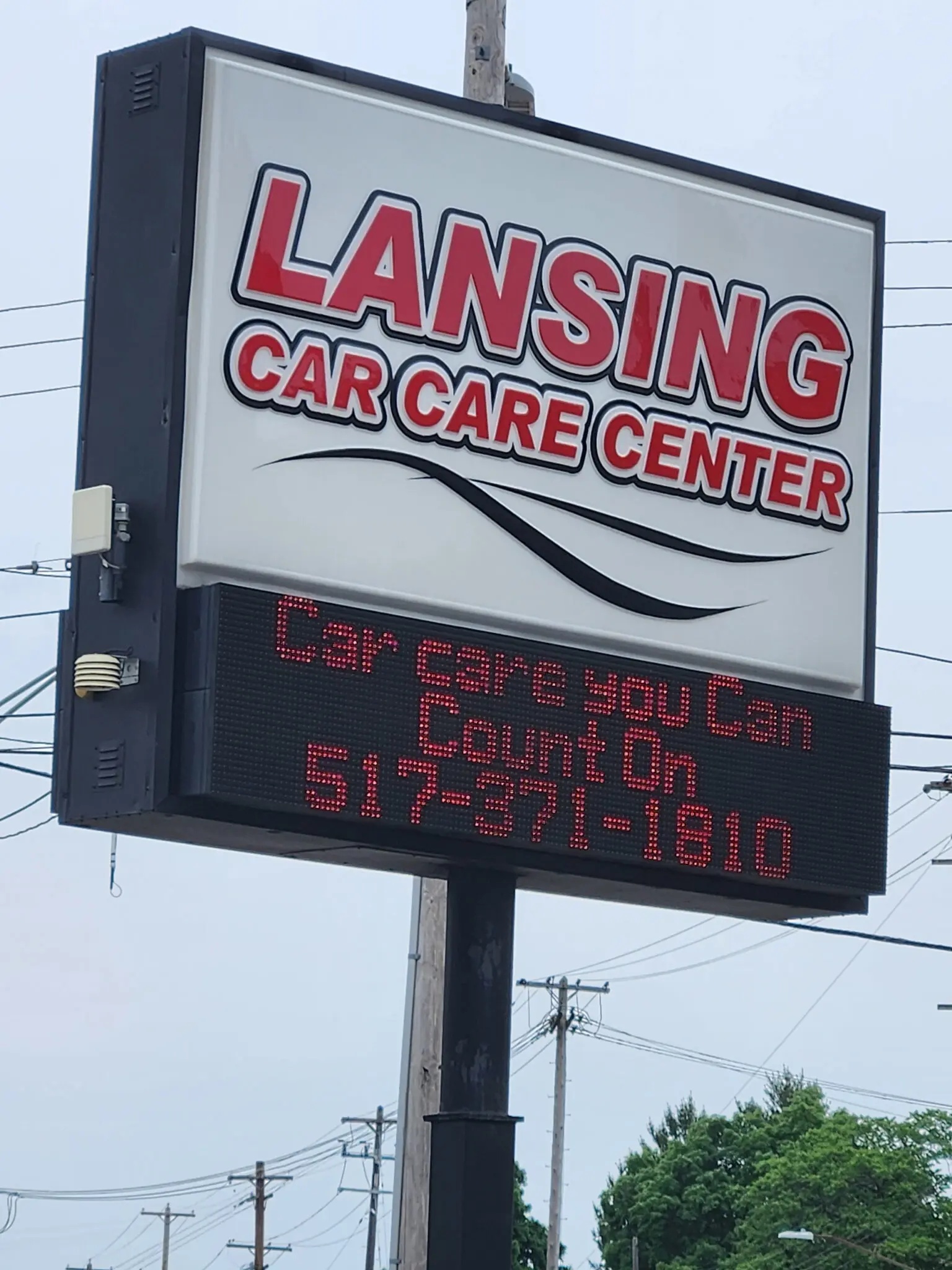 Lansing Car Care Center roadside sign